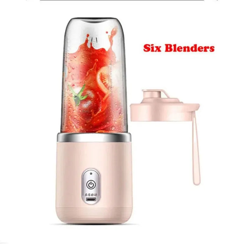 Portable pink personal blender with a detachable lid, showing a transparent container filled with red blended fruit.