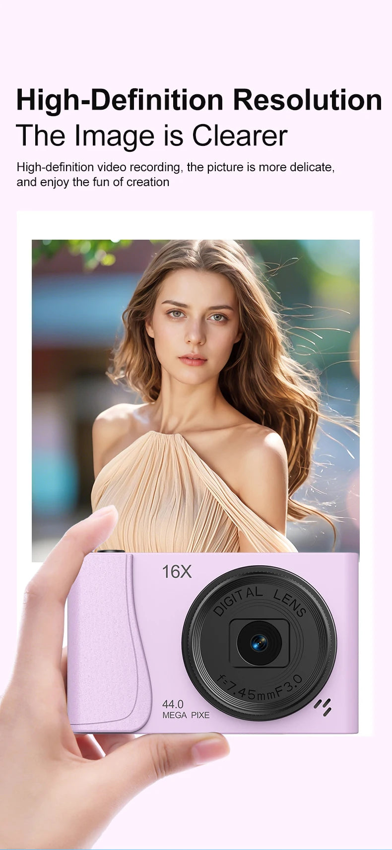 A hand holds a lavender plastic digital camera with a 16X zoom lens, 44-megapixel sensor, and video recording ability.