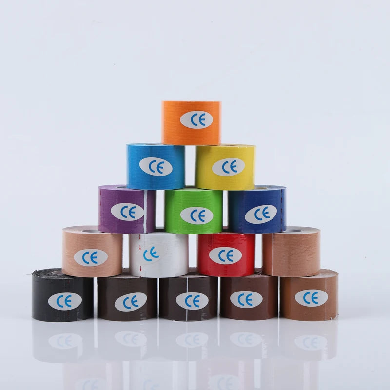 A pyramid stack of multi-coloured kinesiology tape rolls, each featuring a blue 'CE' mark on a white oval.