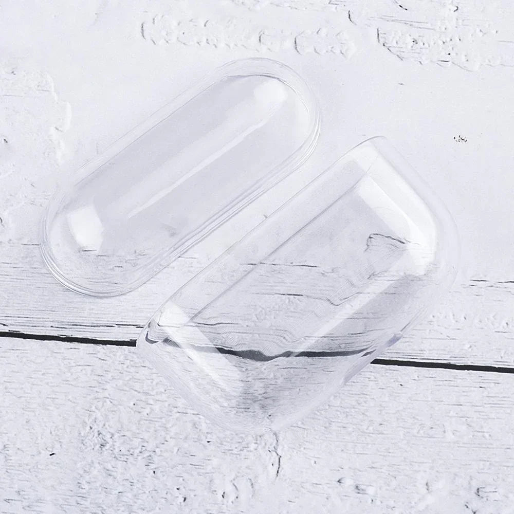 Clear protective case for AirPods Pro on a white wooden background.