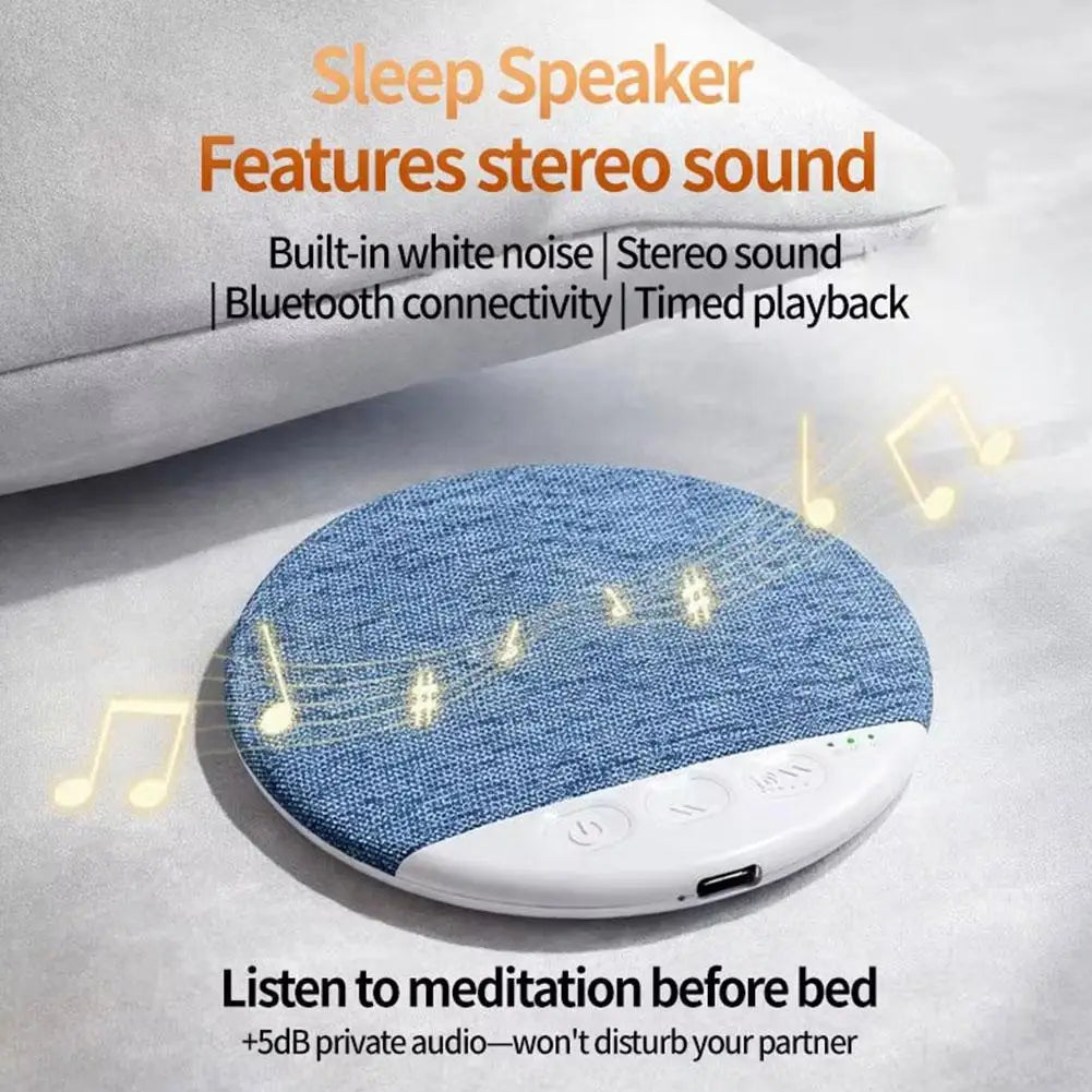 Circular blue fabric Bluetooth pillow speaker with white control panel and glowing music note icons.