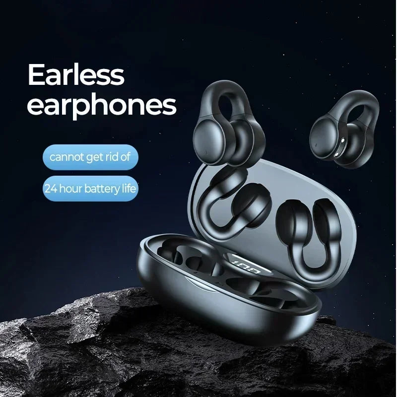 Black wireless ear-clip earphones with a matching charging case on a rocky surface. Text: Earless earphones.