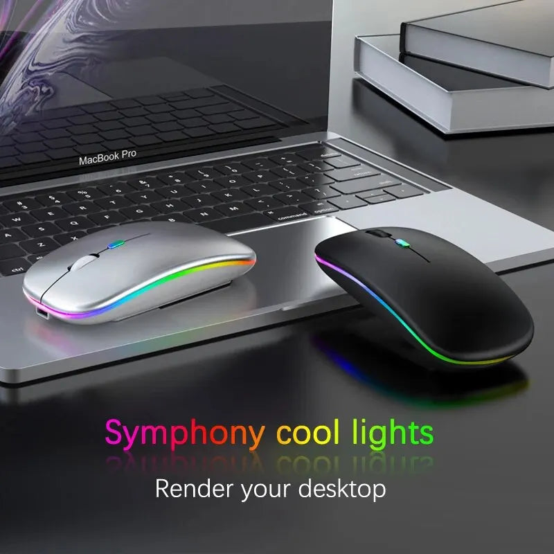 A silver and a black wireless gaming mouse on a laptop, both featuring a sleek design and vibrant RGB LED light strips.