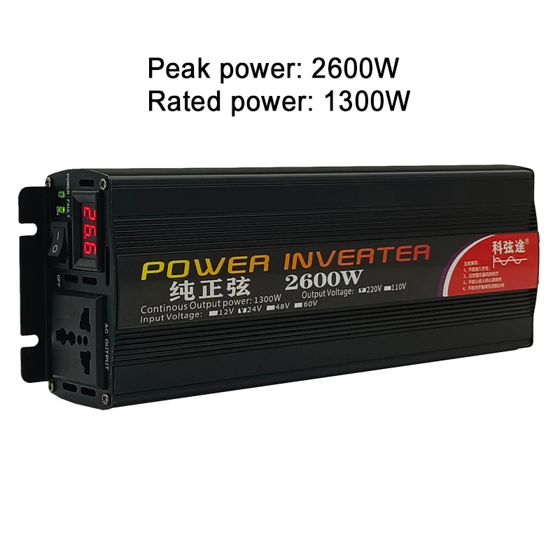 Black power inverter with a digital voltage display, AC output socket, and power switch, rated at 1300W/2600W peak.