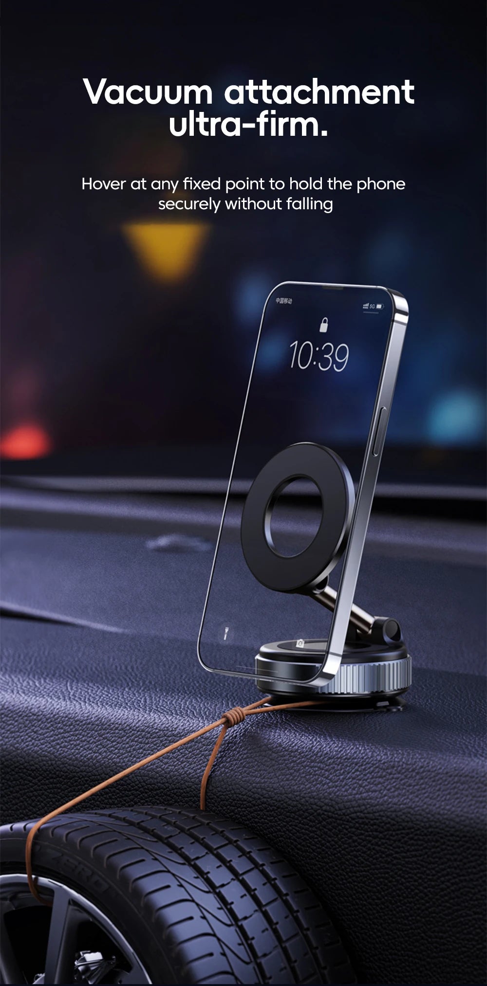 Black magnetic phone mount with a vacuum base, displayed on a dashboard holding a smartphone in a modern, sleek style.