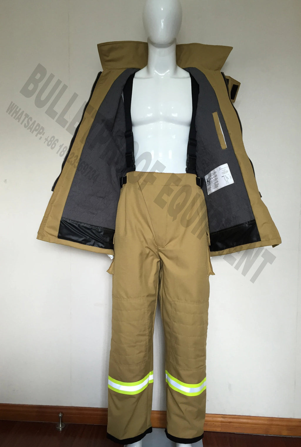 Tan firefighter turnout gear with jacket, suspender pants, and reflective yellow stripes worn on a white mannequin.