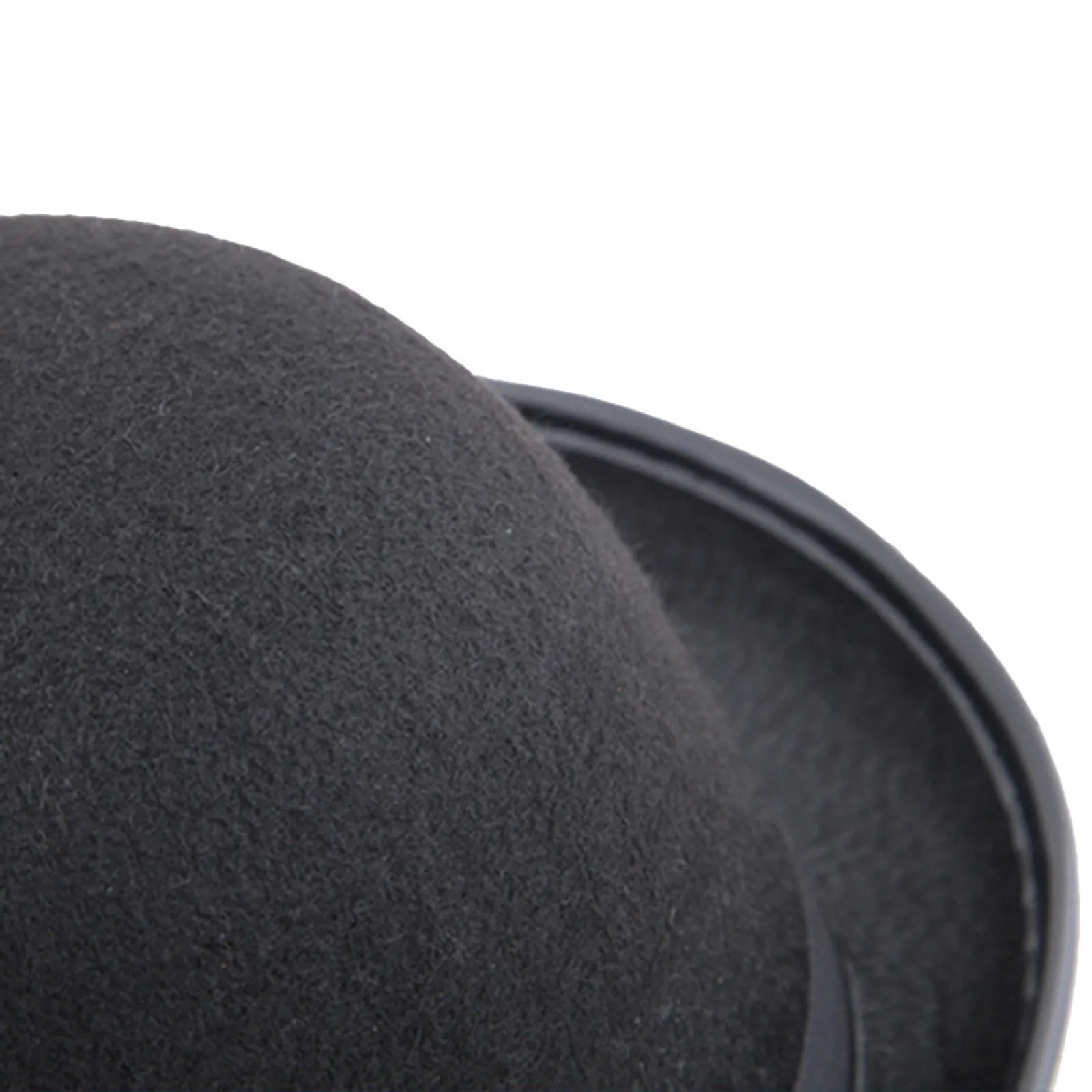 Close-up of a classic black felt fedora hat with a curved brim, set against a plain white background.