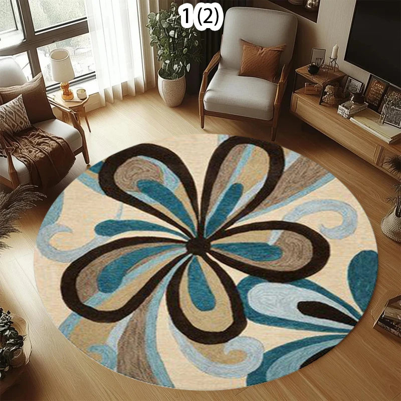 Round rug with a modern abstract floral design in shades of blue, cream, and brown, styled in a vintage aesthetic.