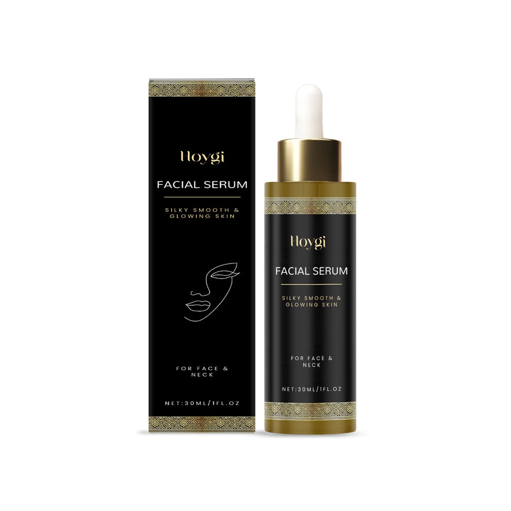 30ml facial serum bottle and box in black and gold, featuring an elegant design for silky, glowing skin.