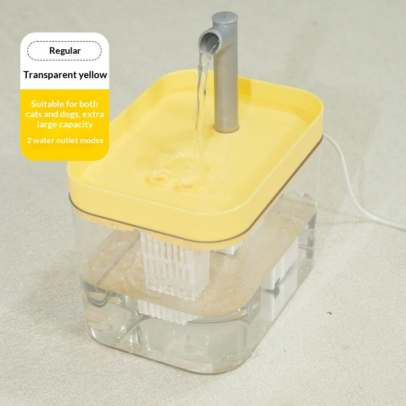 Transparent yellow automatic pet water fountain with a central spout and visible internal filter.