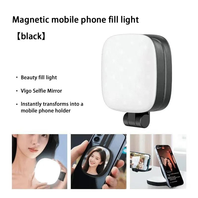 Black square magnetic LED fill light for mobile phones, featuring a built-in selfie mirror and phone stand function.