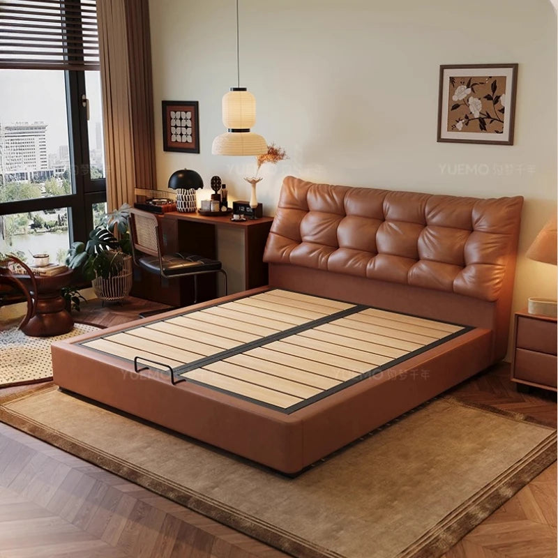 Modern Nordic double bed with a tan faux-leather button-tufted headboard and lift-up slatted storage base.