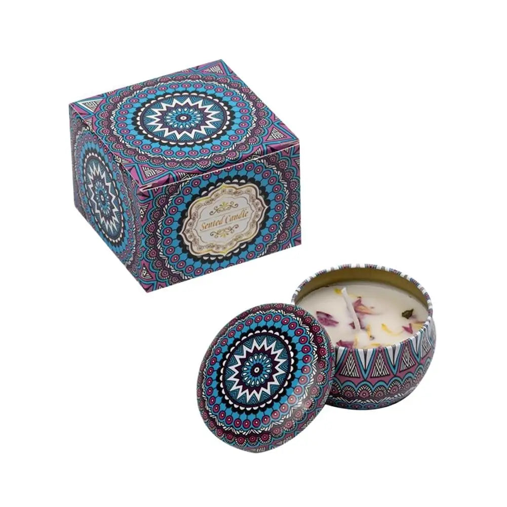 Scented candle in a metal tin with a blue and purple mandala design, including a matching patterned gift box.