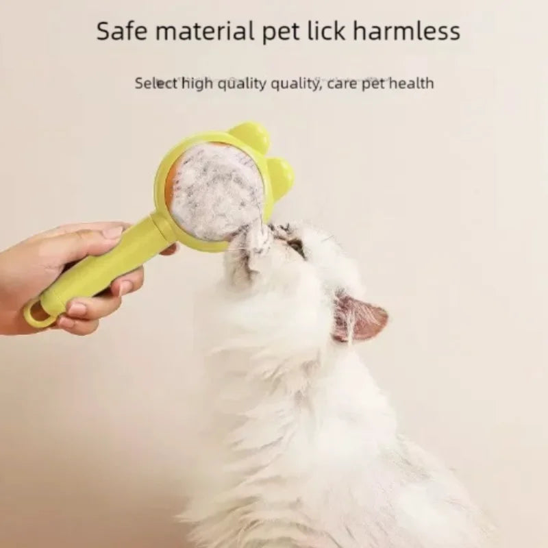 A person holds a lime-green, bear-shaped pet lick tool for a white cat to lick from.
