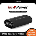 A rectangular, black wireless portable speaker with 80W power, featuring a mesh finish and side bass drivers.