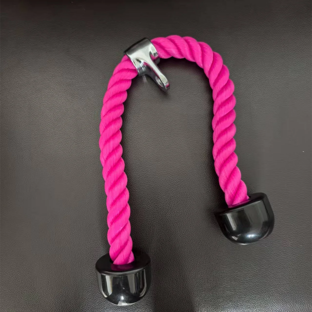 Bright pink tricep rope attachment with black rubber ends and a silver metal center connector on a dark background.