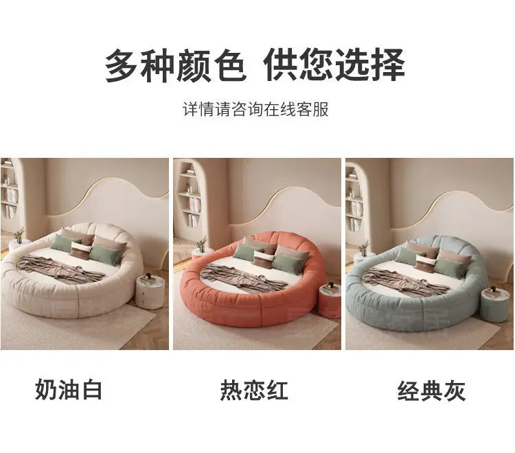 Three modern, round, upholstered bed frames in cream, terracotta red, and sage grey against a minimalist backdrop.