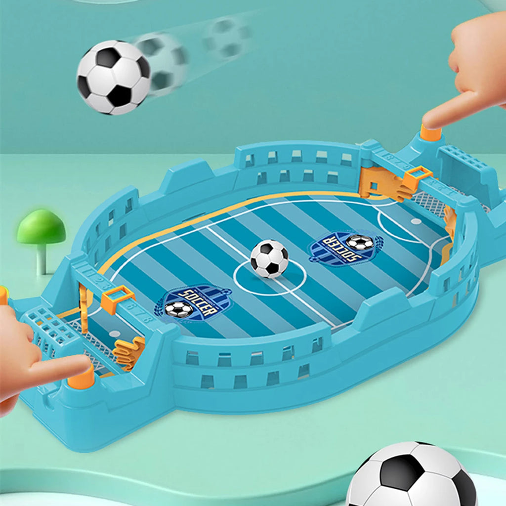 Blue tabletop football game with a mini pitch, goals, and black-and-white soccer balls for two-player action.