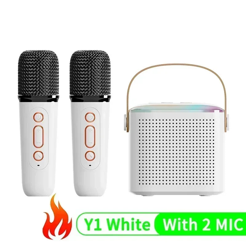 White wireless karaoke speaker with carry handle, RGB lighting, and two matching handheld microphones.