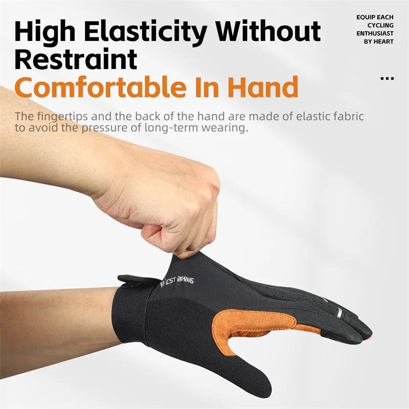 Black and orange West Biking cycling gloves being pulled on, showing a stretchy fabric and a suede-textured palm.