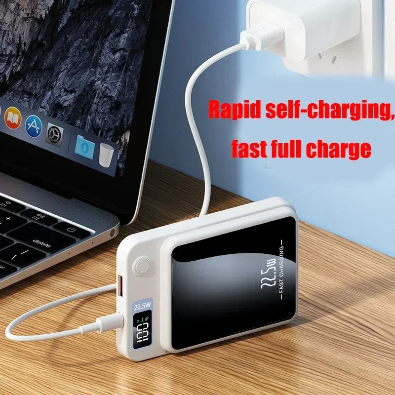 White 20,000mAh magnetic power bank with a glossy black face and digital display showing 100% battery level.