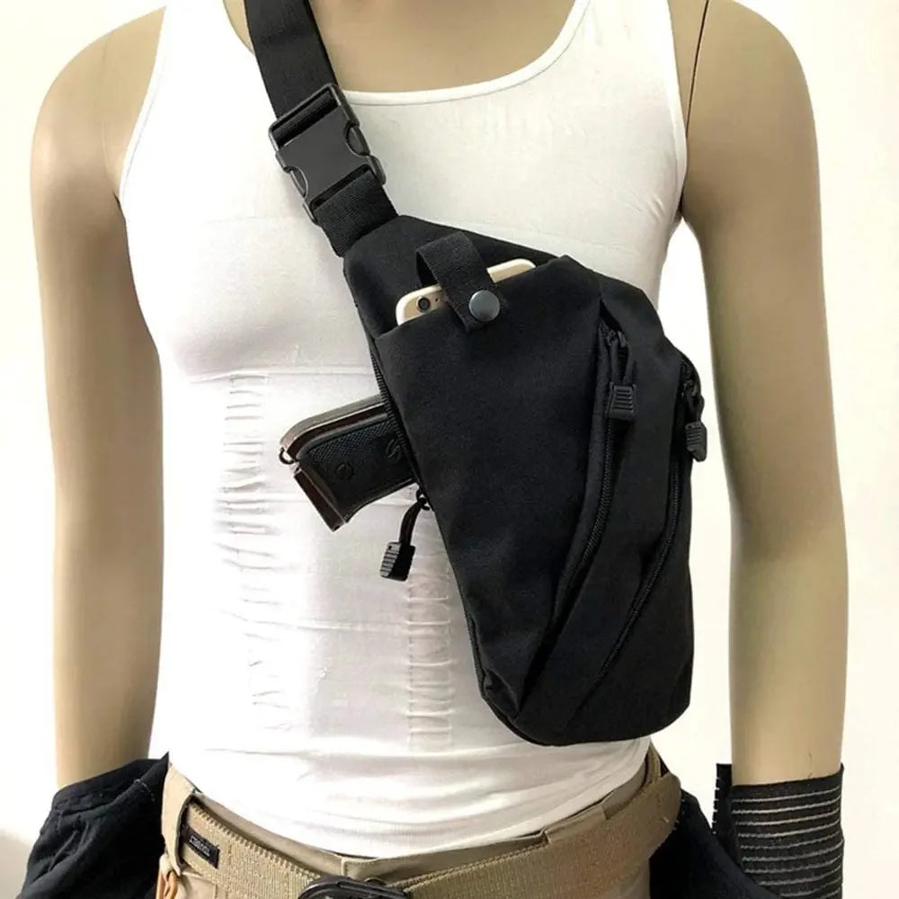 Black compact crossbody sling bag with a secure buckle strap and multiple zipped pockets for organised storage.