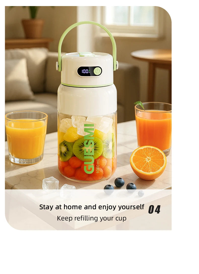 Portable white and green blender with a digital display, handle, and clear glass body, filled with fresh fruit.