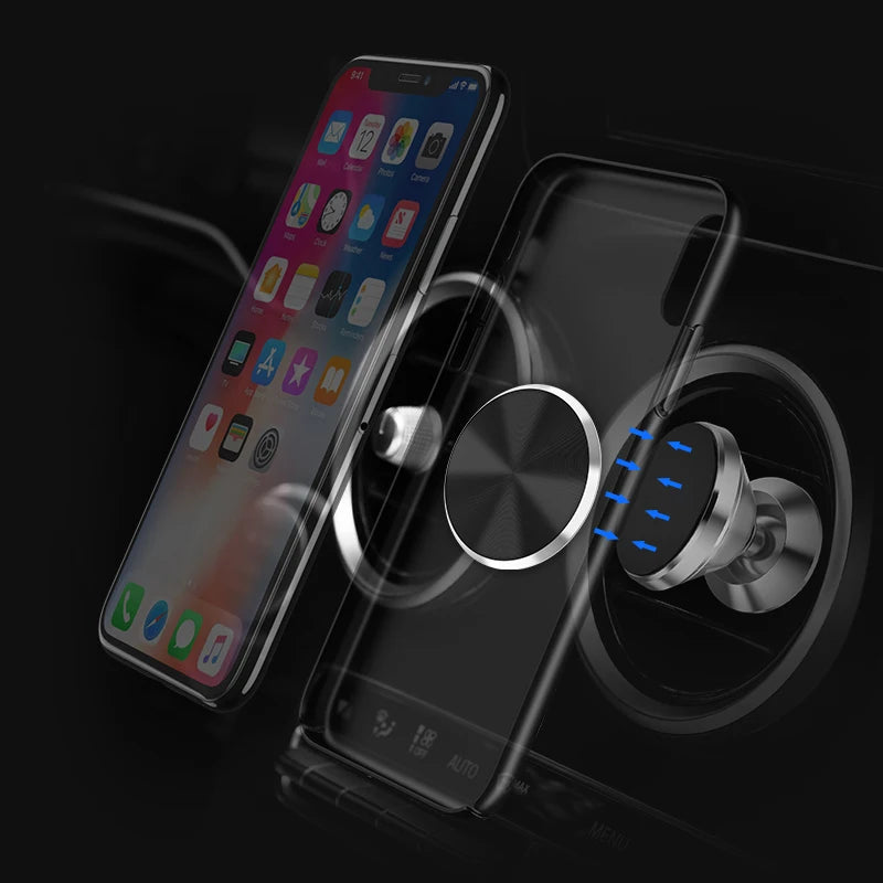 Magnetic black car phone mount attached to an air vent, holding a smartphone with a clear protective case.