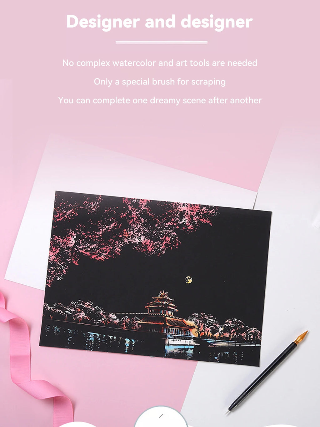 Black scratch art paper featuring a Japanese temple scene at night, with a scraping tool on a pink background.
