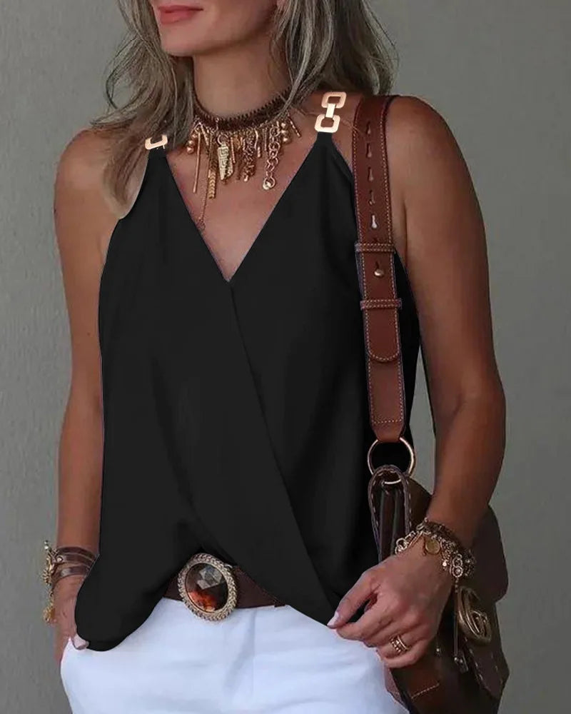 Black sleeveless V-neck top with metallic chain-link straps and a draped, wrap-style front.