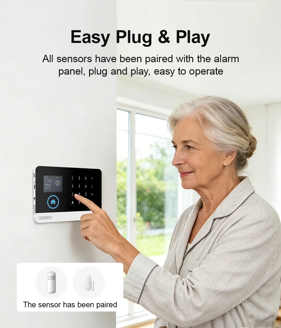 Woman pressing a sleek, white and black wall-mounted smart alarm touch panel with pre-paired wireless sensors.