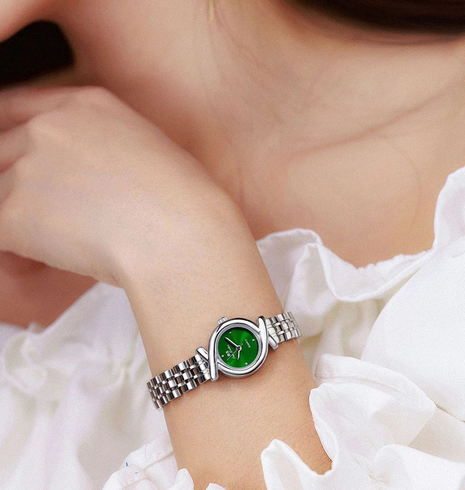 Elegant women's stainless steel quartz watch with a striking emerald green round face and a polished silver link strap.