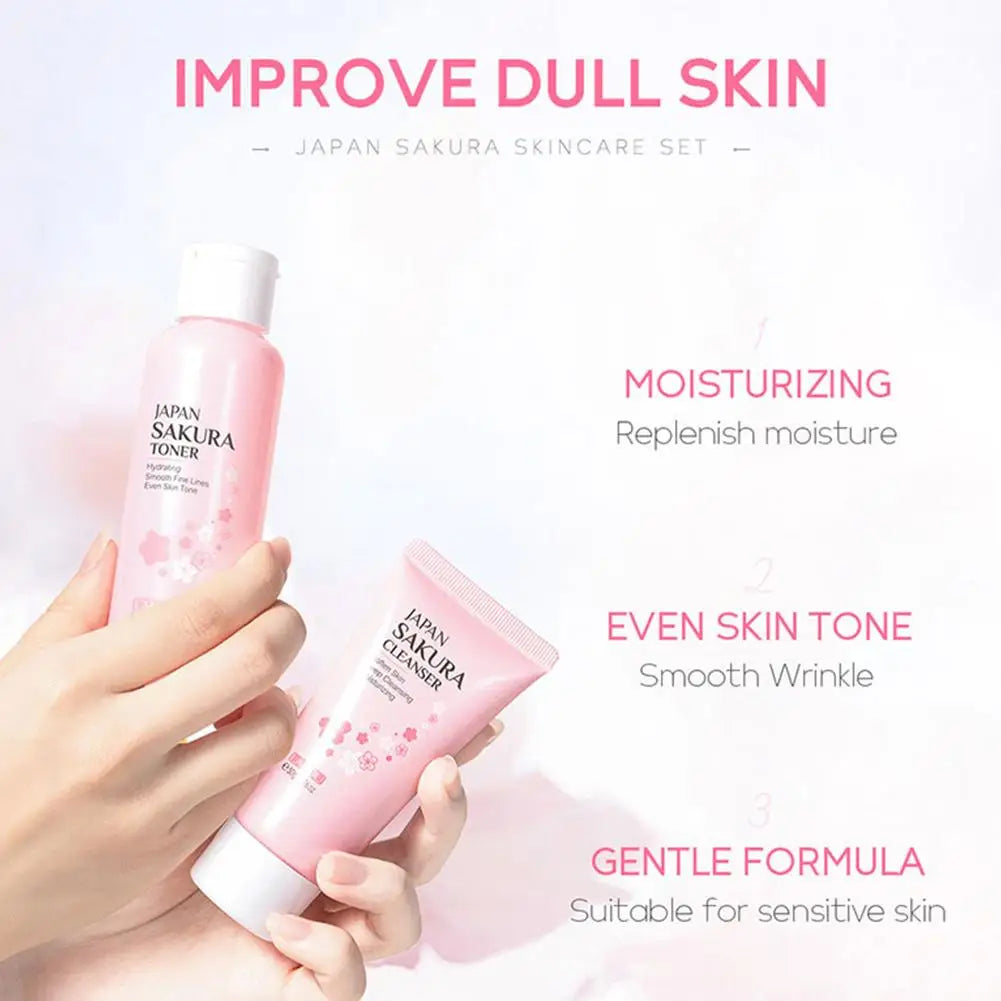 Hands holding a pink sakura-themed facial toner and cleanser set designed to moisturize and even skin tone.