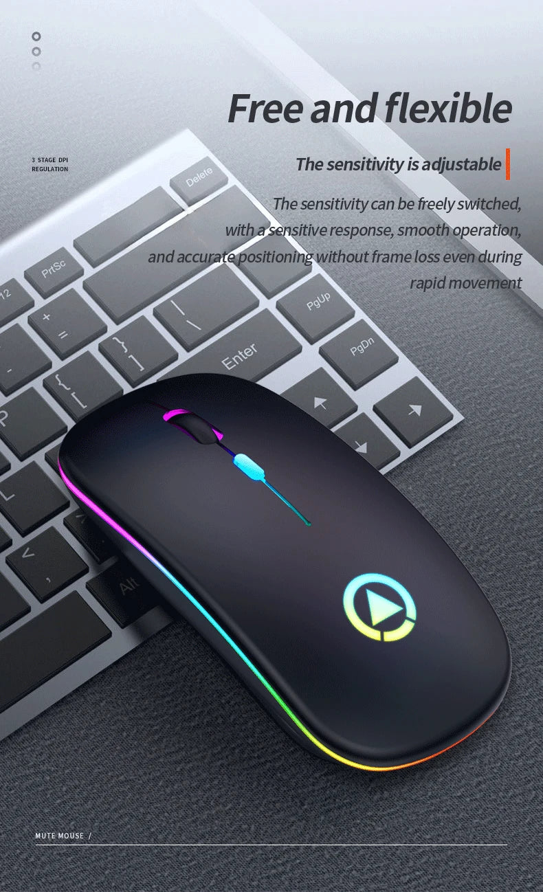 Slim, ergonomic black wireless mouse with colourful LED lighting, sat on a laptop keyboard.