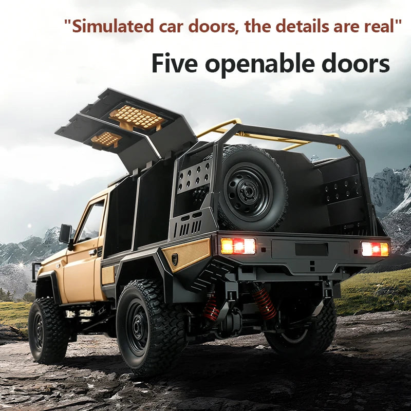 Tan and black 1/12 RC off-road pickup truck with spare tire on the flatbed and open canopy doors.