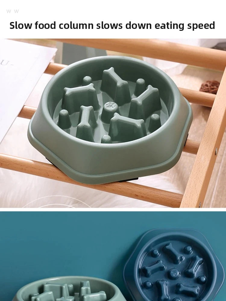 Sage green hexagonal slow-feeder pet bowl with bone-shaped obstacles to discourage fast eating.