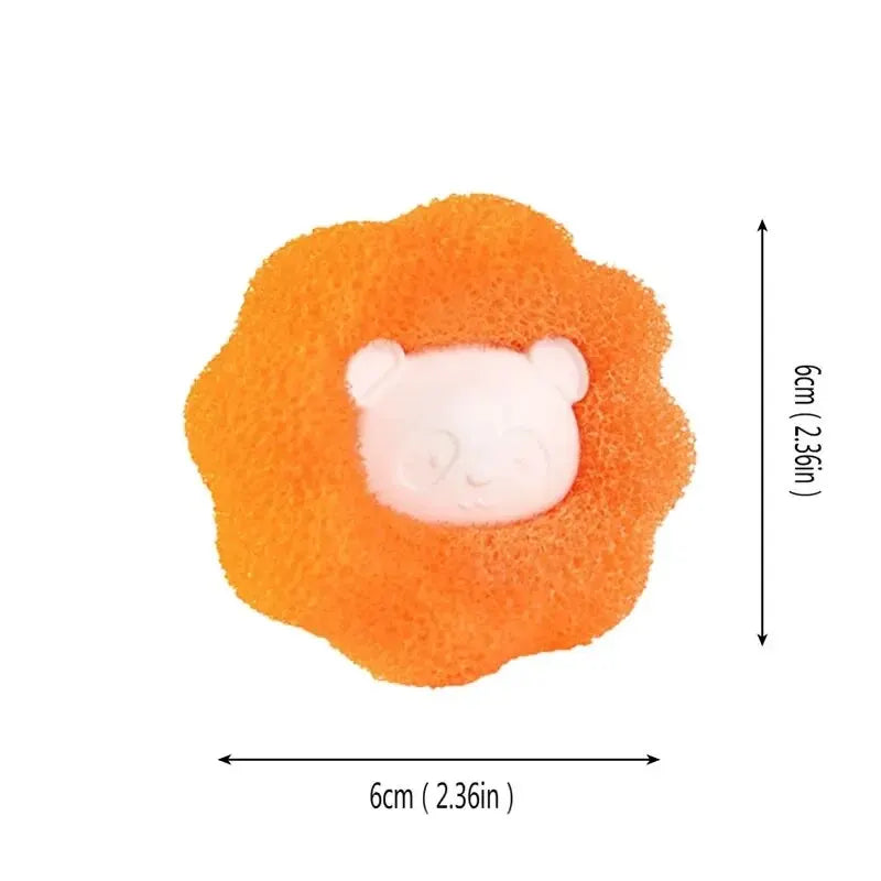 Orange, round, textured cleaning sponge featuring a cute, white, relief-moulded bear face in the centre. 6cm diameter.
