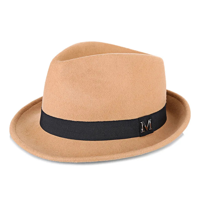 Tan wool felt fedora hat with a black ribbon band and a small silver-tone 'M' detail on the side.