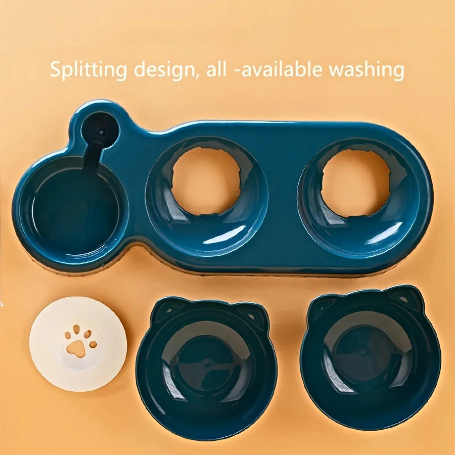 Dark teal 3-in-1 pet feeding station with two detachable bear-shaped bowls, a water dispenser base and floating disc.