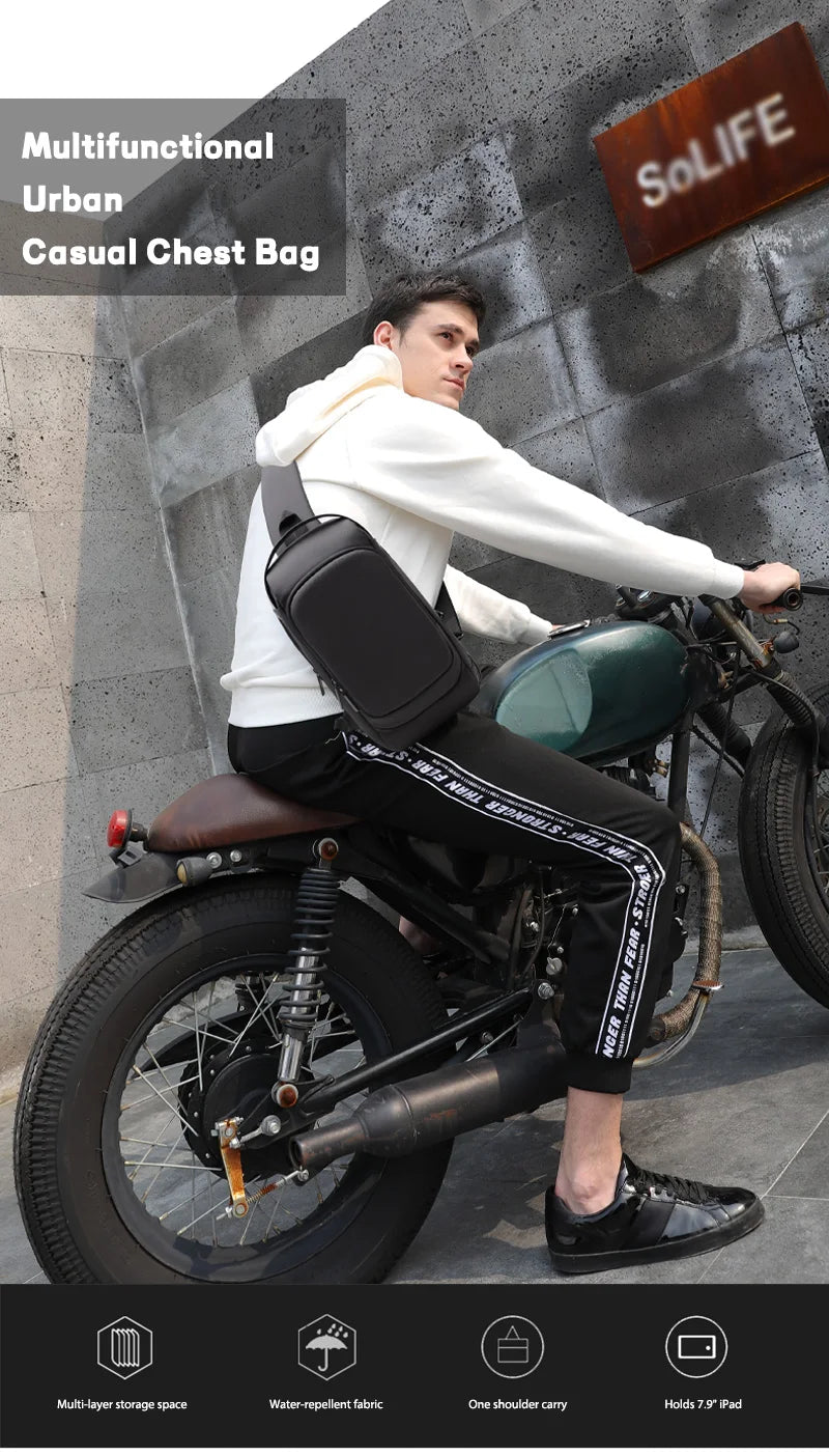 Man wearing a sleek, black waterproof crossbody sling bag while sitting on a motorcycle.