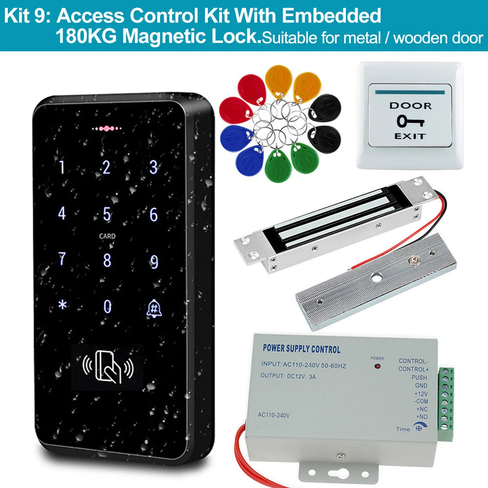 Access control kit with black keypad, metallic magnetic lock, white exit button, power supply, and colorful key fobs.