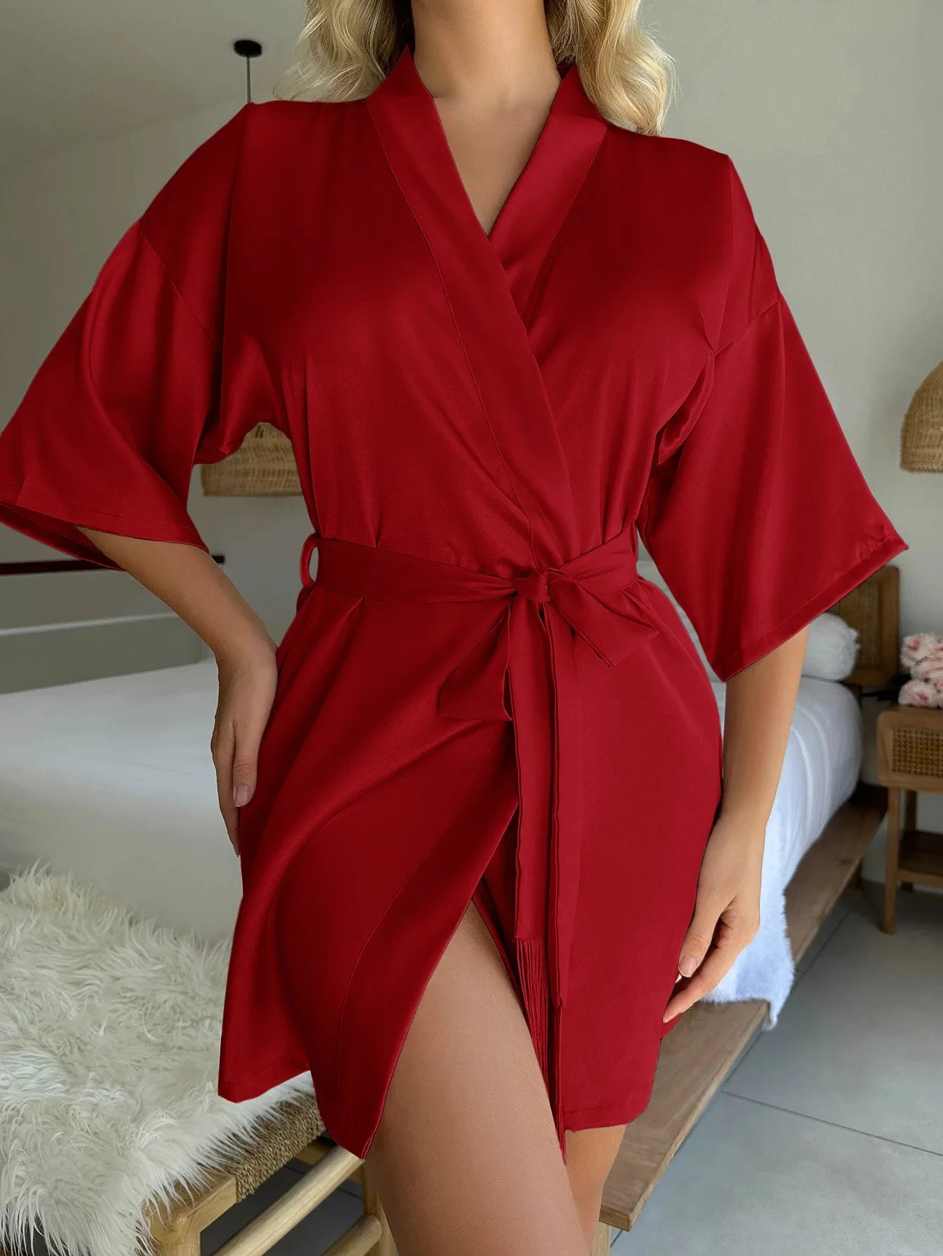 Short red satin kimono robe with wide sleeves and a matching waist tie belt.