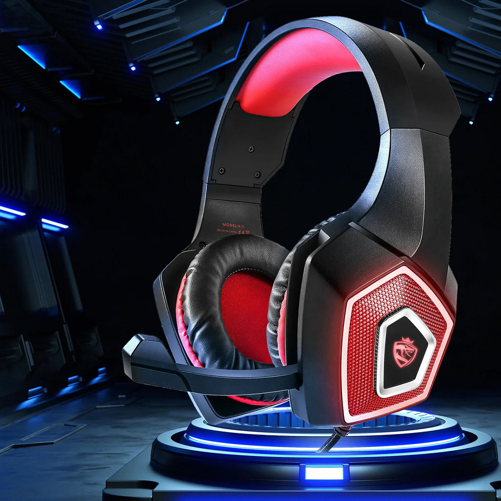 Black and red wired gaming headset with glowing RGB lighting, padded ear cushions, and an integrated microphone.