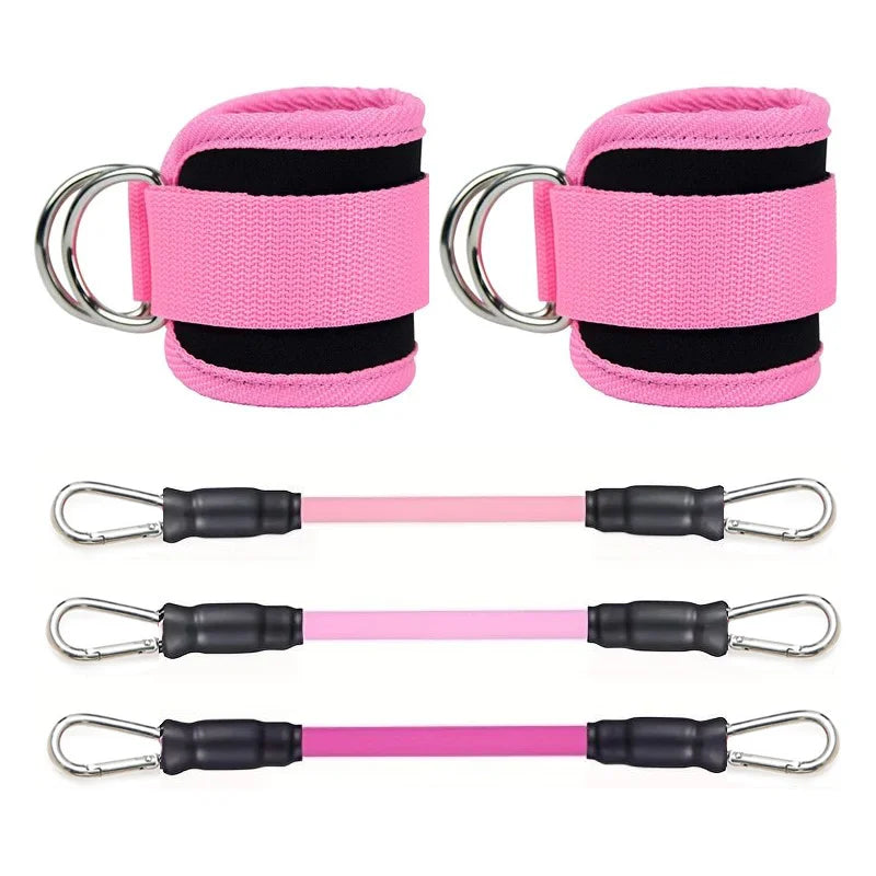 A pair of pink and black ankle straps with metal D-rings and three resistance bands in varying shades of pink.