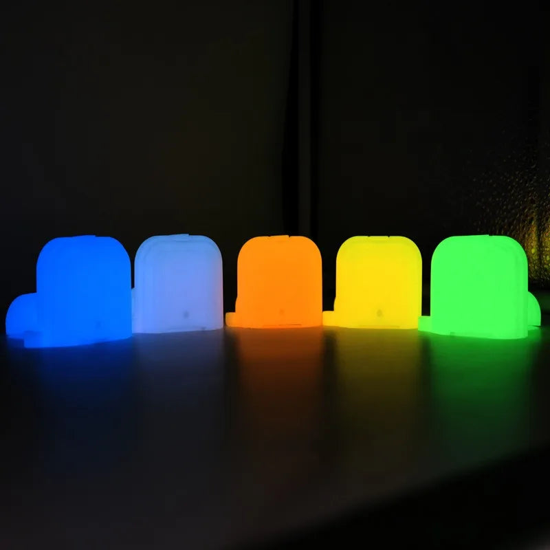 Five glow-in-the-dark silicone cases for Apple AirPods, displayed in assorted neon colours against a black background.