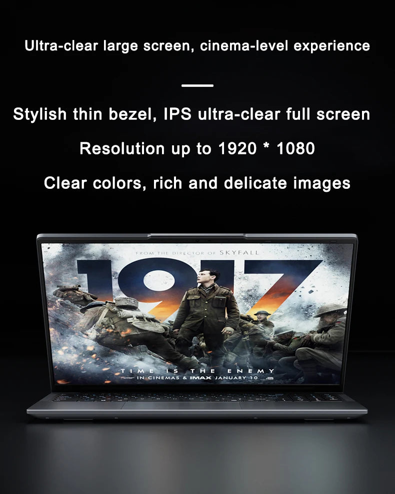 A dark grey 15.6-inch laptop with a thin-bezel, high-definition display showing a cinematic scene.