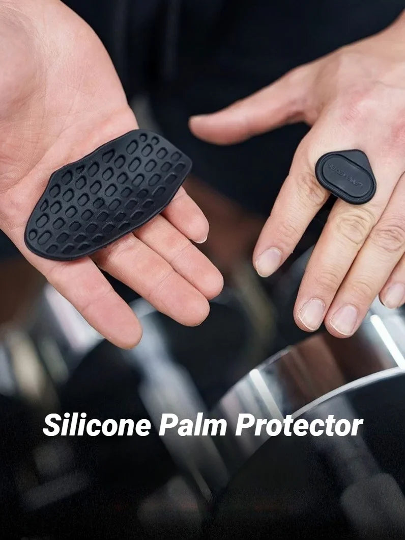 Black silicone palm protector with a textured honeycomb surface, held in a hand next to a matching finger loop.