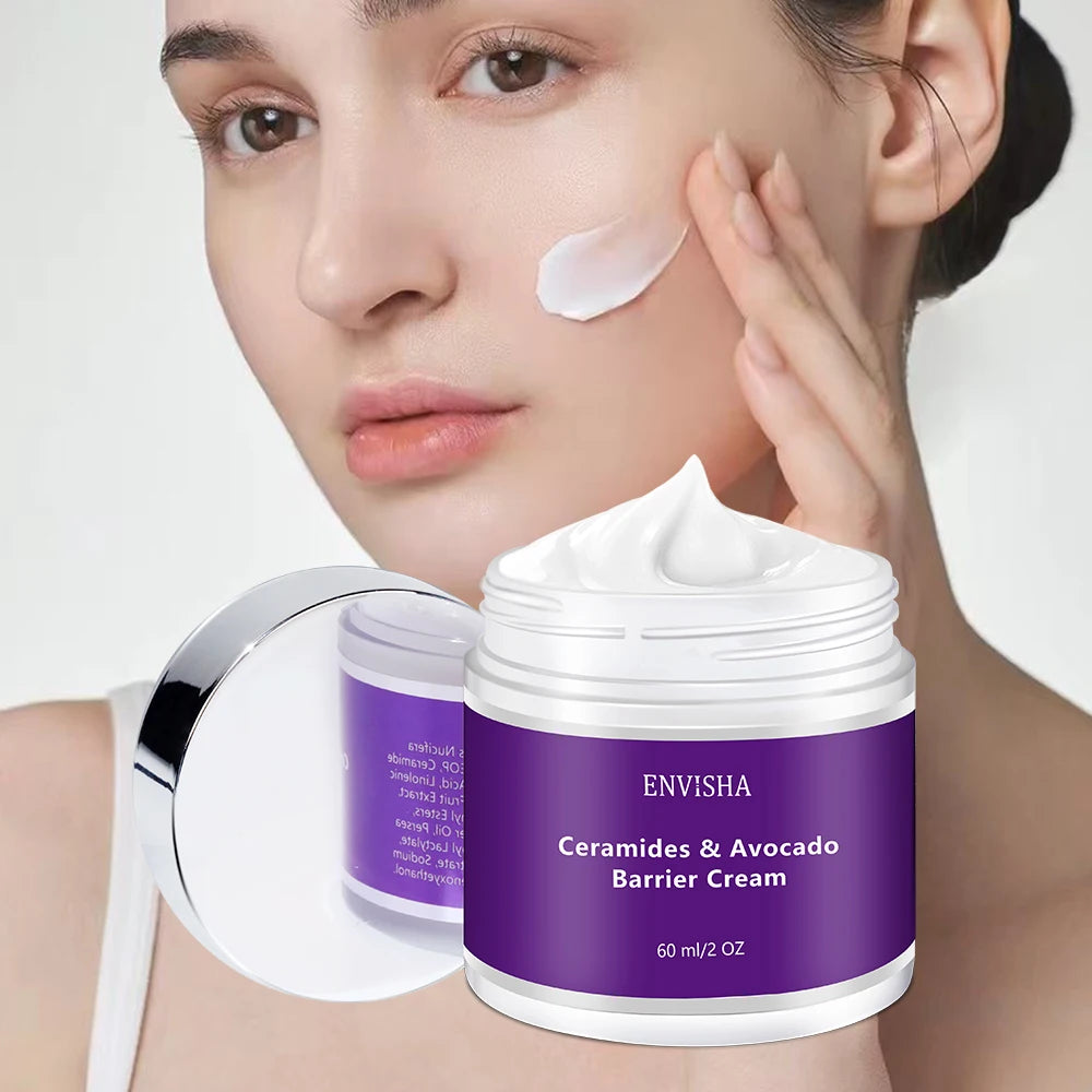 Ceramides & Avocado barrier cream in a purple 60ml jar, shown with woman applying white moisturising cream to her face.