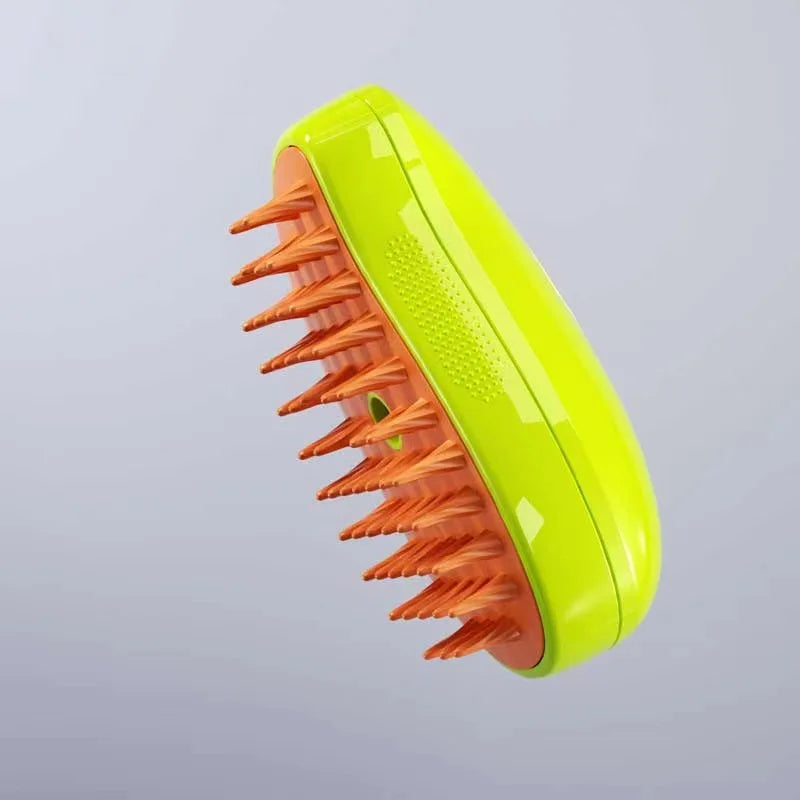 Bright lime green scalp massager with flexible, long orange bristles on a grey background.