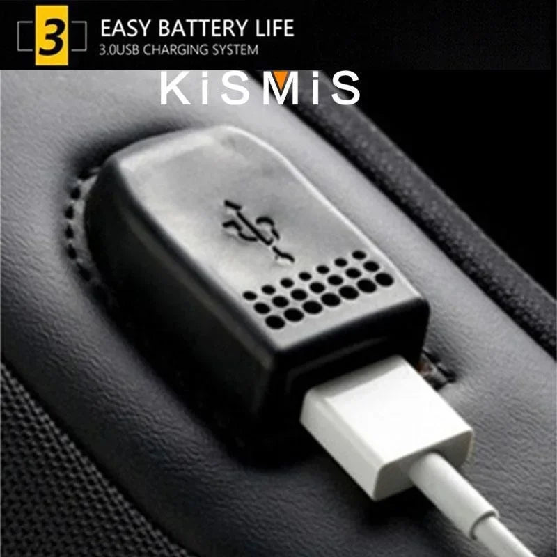 Close-up of a black, waterproof bag featuring an integrated USB charging port with a white cable plugged in.
